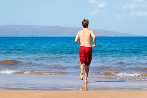 Runner on beach Stock Photos