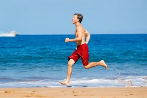 Runner on beach Stock Photos