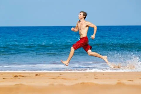 Runner on beach Stock Photos