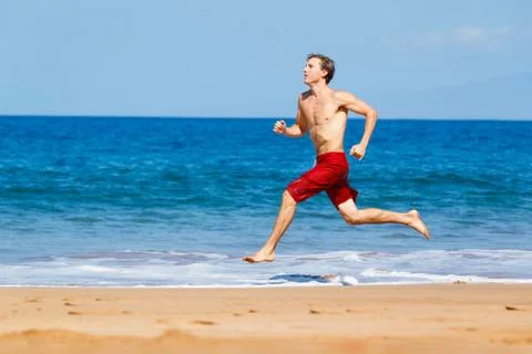 Runner on beach Stock Photos