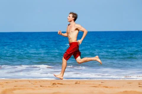 Runner on beach Stock Photos