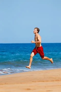 Runner on beach Stock Photos