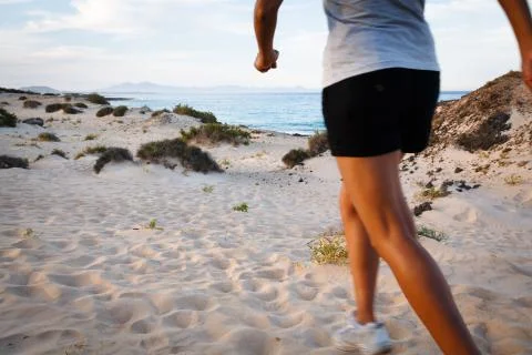 Runner on beach Stock Photos