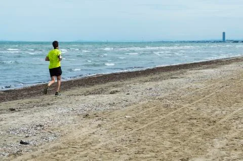 Runner on the beach Stock Photos