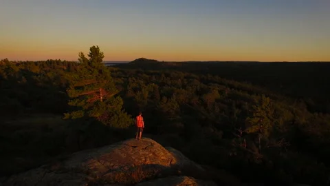 A runner on a bluff in Northern Michigan Stock Footage 136676697