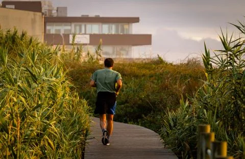 Runner on Boardwalk Stock Photos