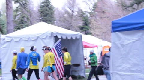Runner Carrying American Flag. Video stock 22731517