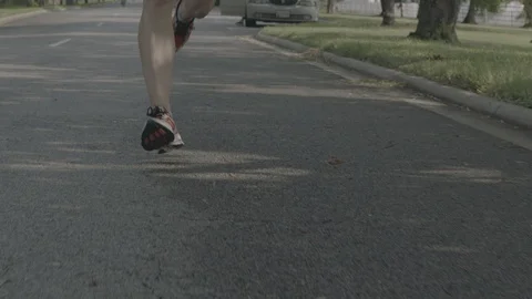 Runner close-up feet slow-motion Stock Footage 104688647