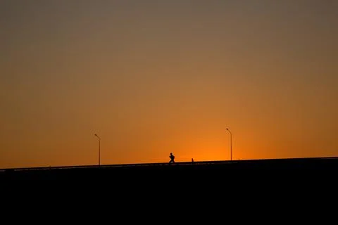 Runner on the dam Stock Photos