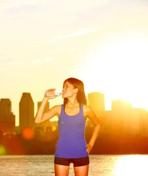 Runner drinking water city running in Montreal Stock Photos