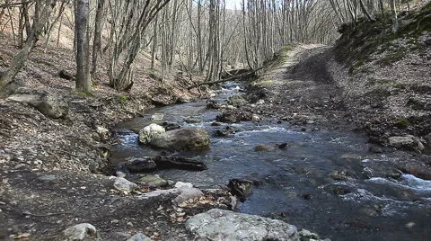 Runner forcing a stream Stock Footage 1013040