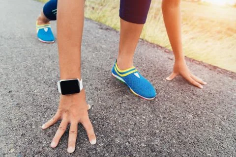 Runner gesture ready start to run on road Stock Photos