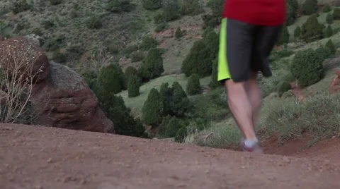 Runner Goes Down Mountain Video stock 51333170