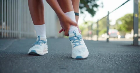 Runner, hands and ankle pain on street with injury, fatigue and sprain with Stock Footage 305326959