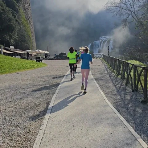 Runner jogging along scenic path near Marmore Falls, Terni, Italy Stock-Footage 302402366