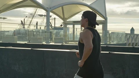 Runner Jogging Open Shoreline Views — Alameda Marina Park Northern California Stock Footage 330021843