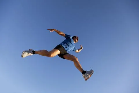 Runner jump at the city Stock Photos