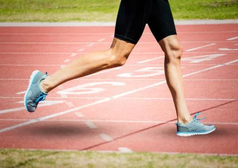 Runner legs on start line Stock Photos