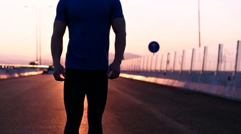 Runner man stretching and resting after running on  road.Handsome Caucasian m Video stock 67363133