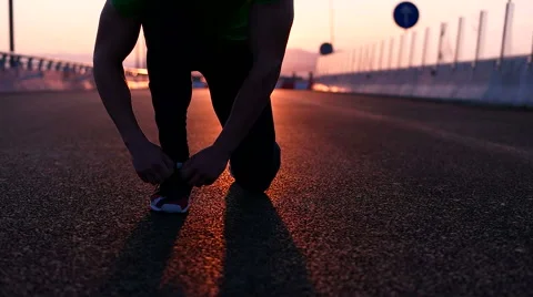 Runner man stretching and taking rest on road. Handsome Caucasian male fitnes Video stock 67365788