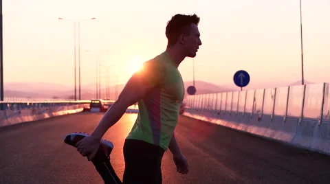 Runner man stretching and taking rest on road. Handsome Caucasian male fitnes Video stock 67367015