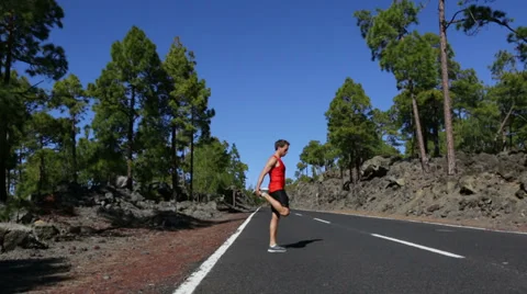 Runner man stretching thigh and legs Video stock 37661368