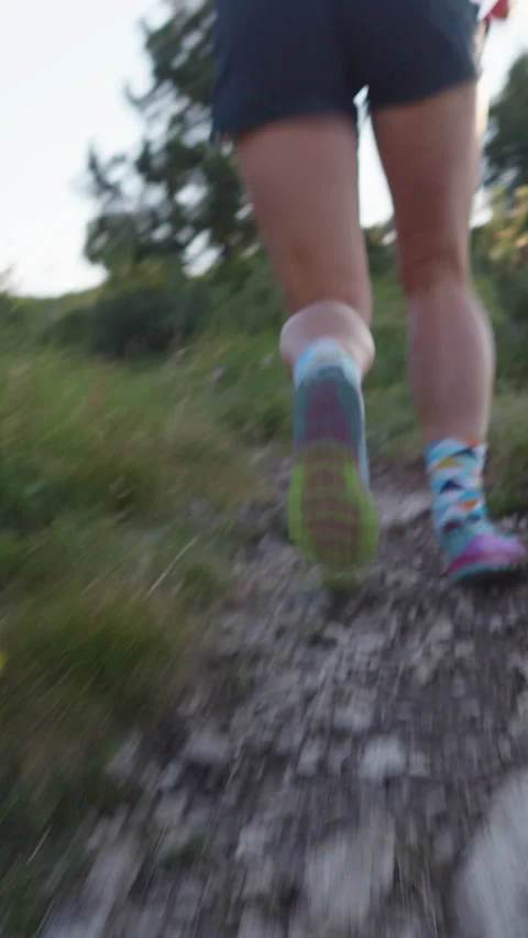 Runner Mid-stride on Scenic Trail Stock-Footage 314202375