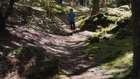 Runner on a mountain path Stock Footage 114173829