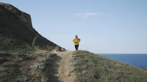 Runner in the mountains Stock Footage 105404179
