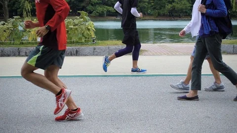 Runner in the park in super slow motion Stock Footage 80060246