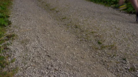 Runner passes through frame while running in the mountains. Stock Footage 63019520