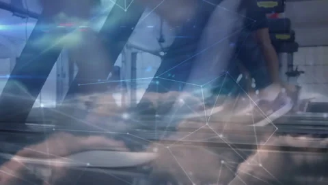 Runner pressing console starting treadmill, viewing pulsing node overlay syncing 스톡 동영상 313294585