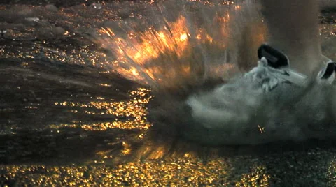 Runner puddle splash. Closeup. Stock Footage 50628895