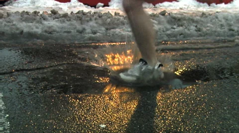 Runner puddle splash Stock Footage 50628876