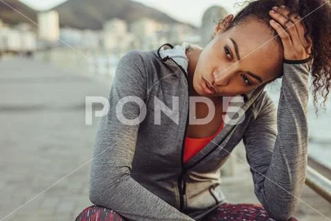 Runner resting after intense training Stock Photos