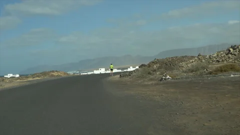 Runner on the road in Lanzarote Stock Footage 171272545