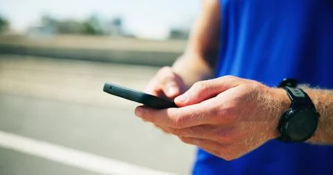 Runner, road or phone in hands with fitness for checking workout progress Stock Photos