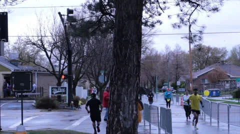 Runner rounding the corner Stock Footage 22734391