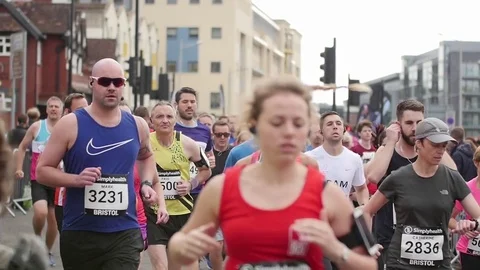 Runner Running at Bristol Half Marathon 2017 UK, Slow Motion Stock Footage
