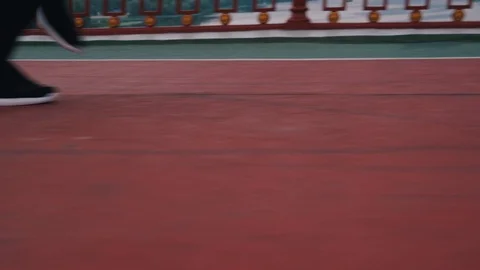 Runner runs in the city view on legs Stock Footage 117541760