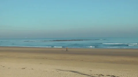 Runner on shoreline Stock Footage 104312121