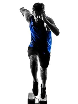 Runner sprinter running sprinting athletics man silhouette isola Stock Photos