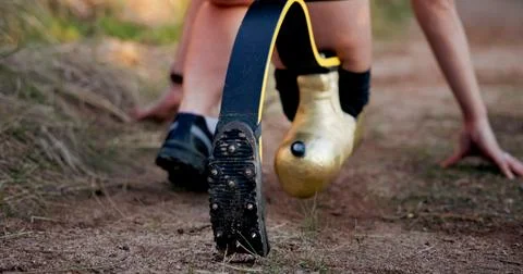 Runner, start and running with prosthetic leg in nature for sprint, fitness.. Stock Photos