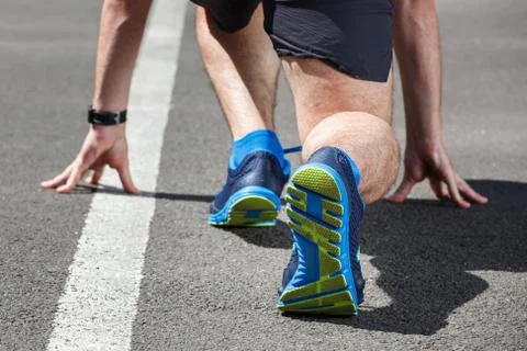 Runner in start position. Foto stock