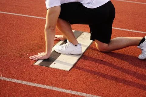 Runner starting position Stock Photos