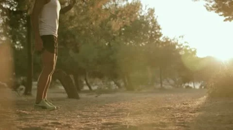 Runner is stretching his legs 스톡 동영상 12126592