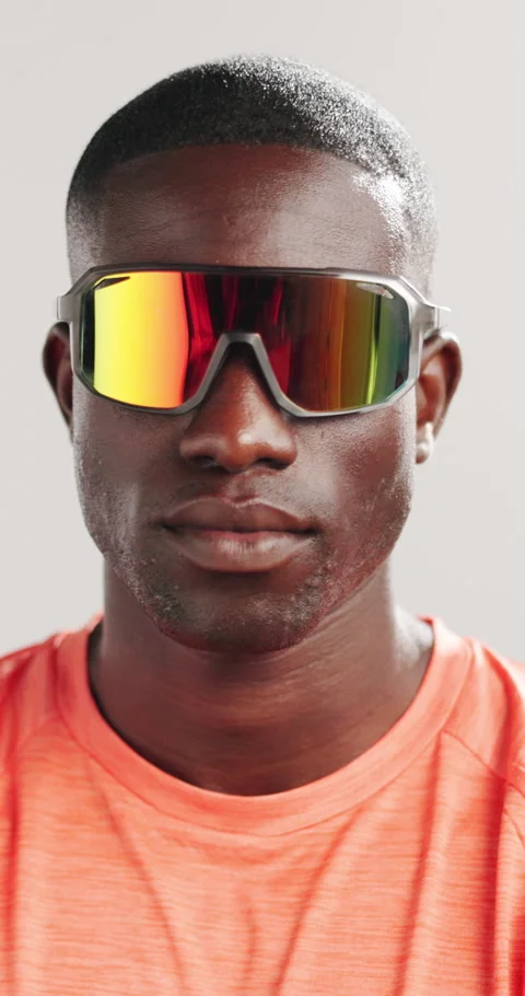 Runner, sunglasses and face of black man in studio for health, fitness and Stock Footage 320599336