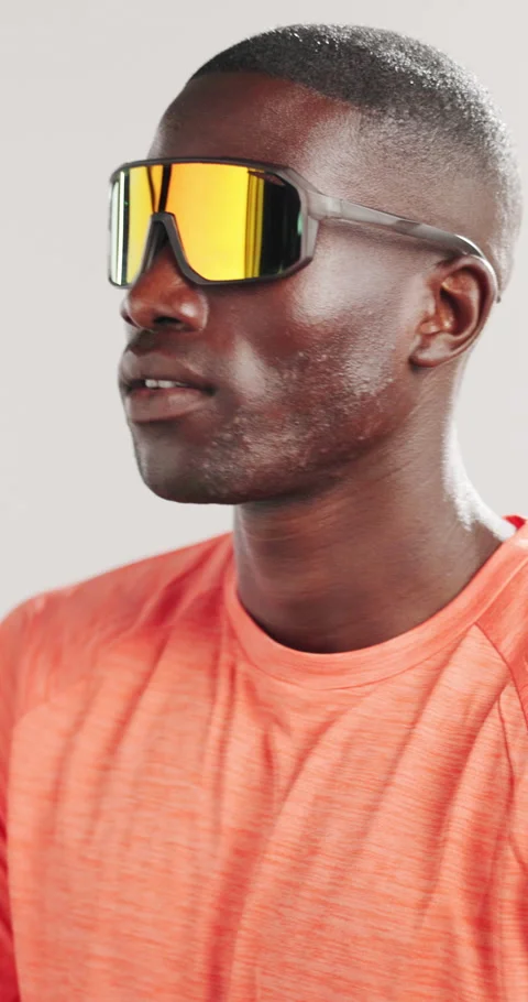 Runner, sunglasses and stretching of black man in studio for health, fitness and Stock Footage 320455085