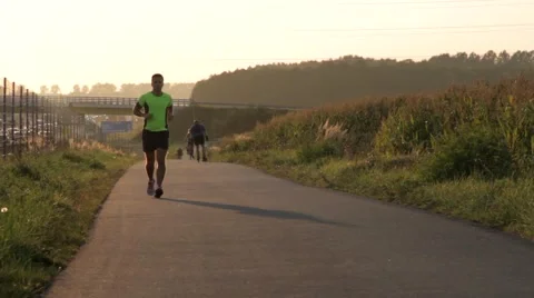 Runner in the sunset Video stock 67625909