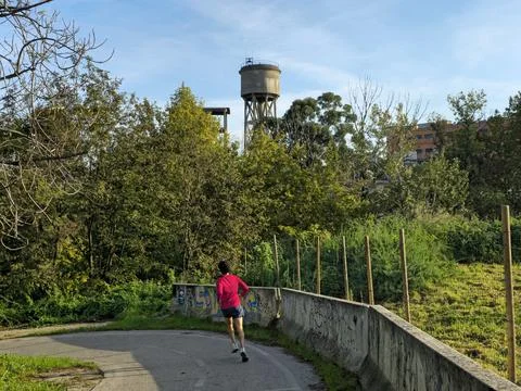 Runner on Tevere Cycle Path, Marconi district Rome  Stock Photos